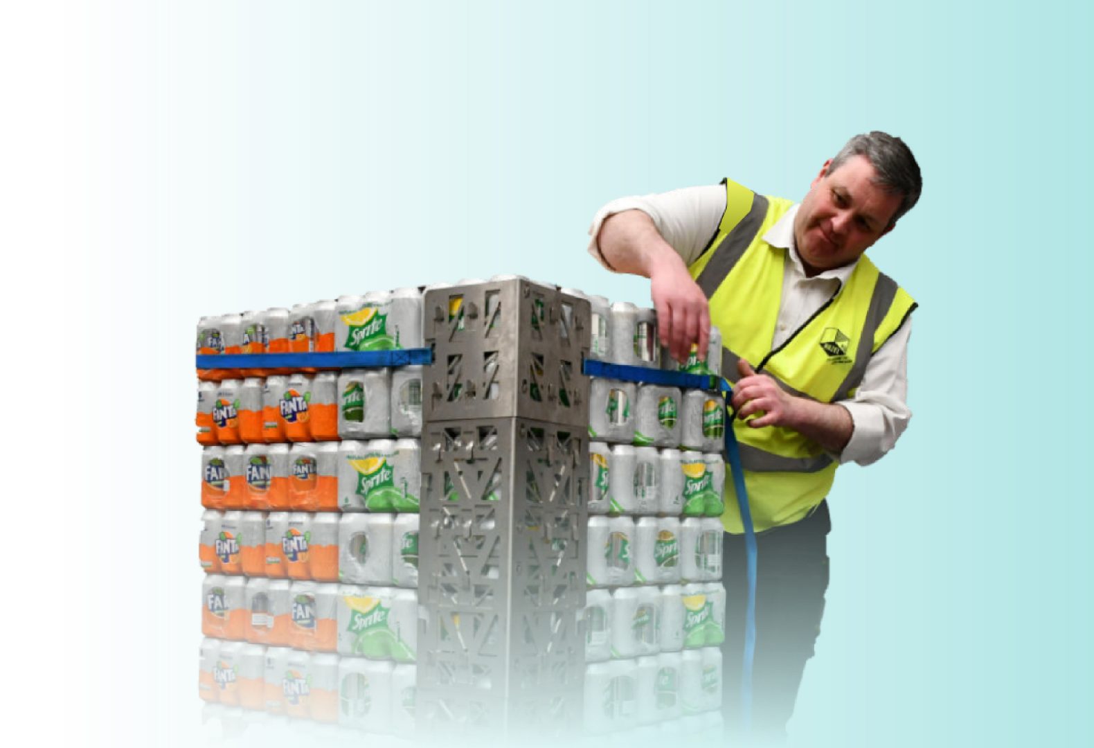 man in hi-viz securing drinks cans with load stability items