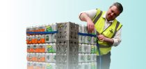 man in hi-viz securing drinks cans with load stability items