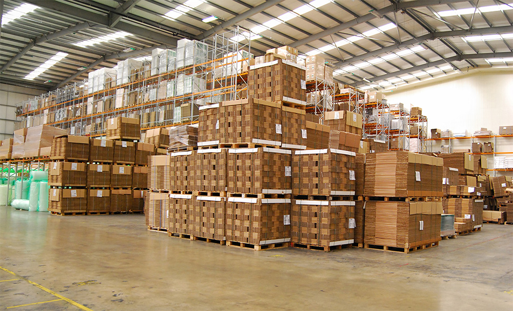 Large warehouse with palettes of boxes
