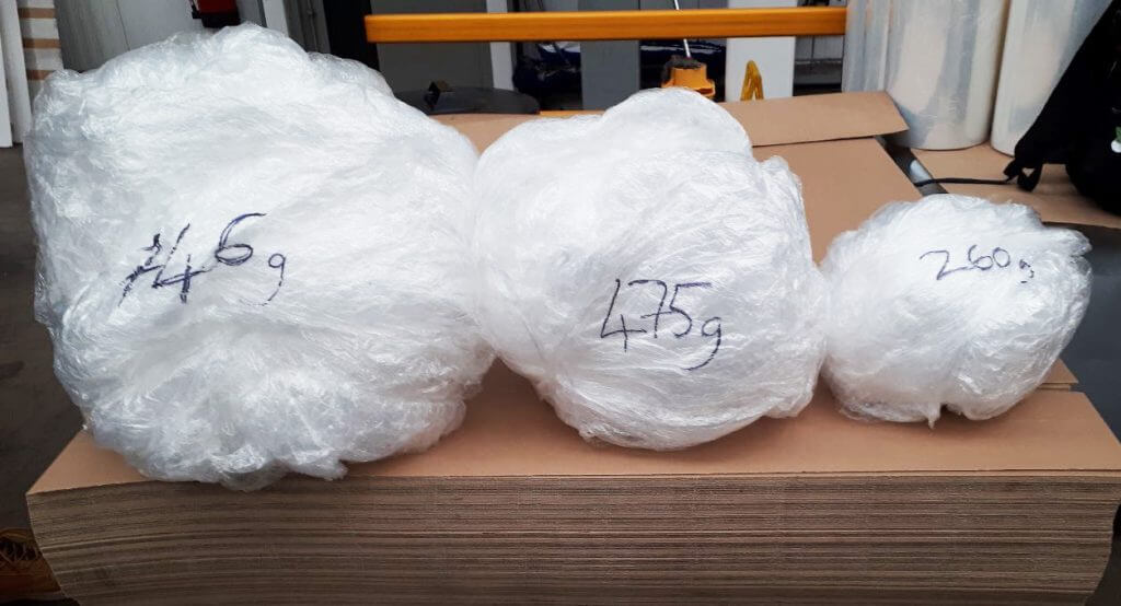balls of plastic film labelled; 746g, 475g, 260g